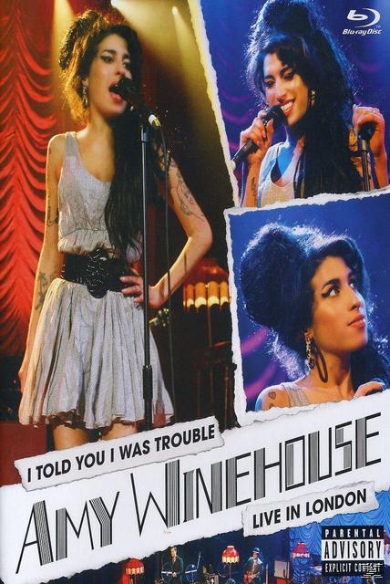 Amy Winehouse auf der Bühne vor einem Live-Publikum.
