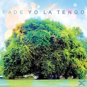 Ein großer Baum mit grünen Blättern. Die Worte 'FADE YO LA TENGO' stehen darüber.