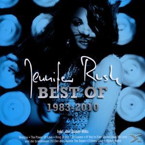 Albumcover von Jennifer Rush, Best of 1983-2010. Eine Frau mit verschwommenem Hintergrund aus blauen Kreisen.