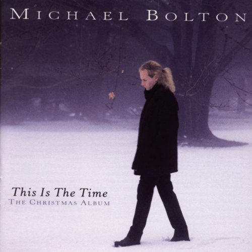 Michael Bolton 'This Is The Time' albumának borítója. Bolton hóban sétál, téli jelenet.