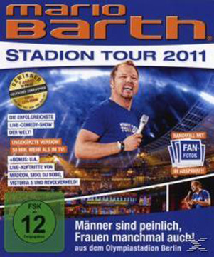 DVD-Cover mit Mario Barth, Titel 'Stadion Tour 2011'. Mann mit Mikrofon, lächelnd. Grünes FSK 12-Logo.