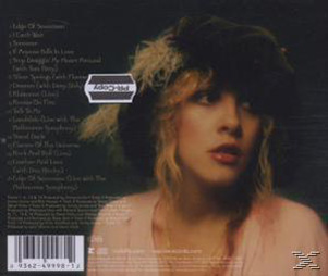 Albumcover: Stevie Nicks mit dunklen Haaren und rosa Hemd. Rückseite des Albums ist sichtbar.