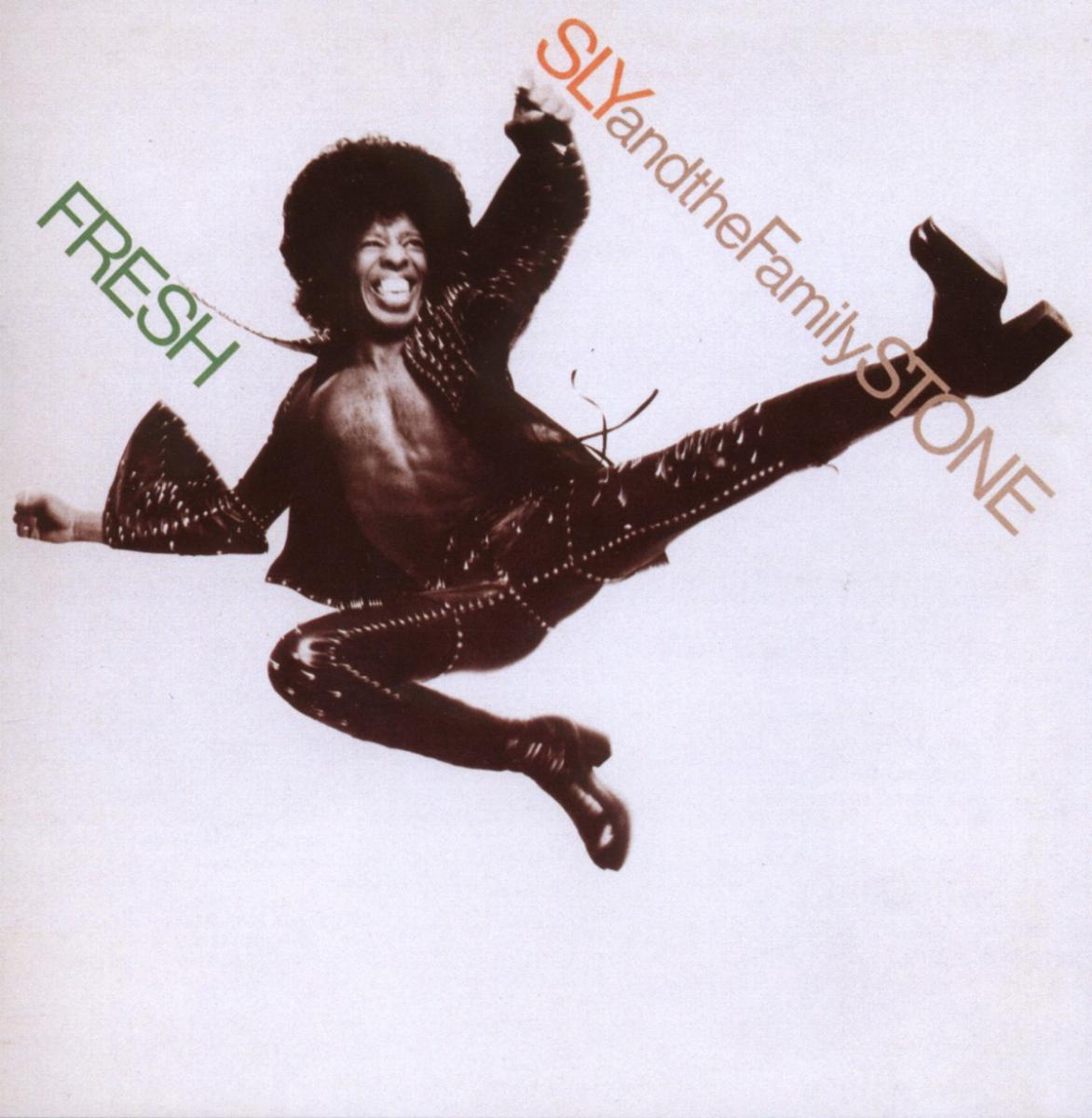 Sly and the Family Stone Albumcover. Ein Mann in der Luft mit einer energiegeladenen Pose. Weißer Hintergrund.