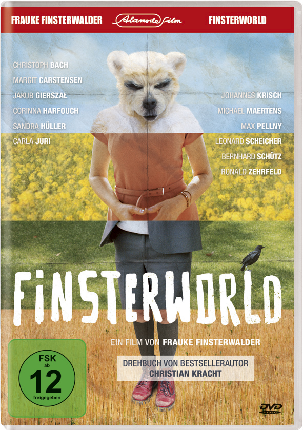 DVD-Cover mit einer Frau mit Hundekopf, mit Text auf Deutsch. Im Hintergrund ist ein Feld zu sehen.
