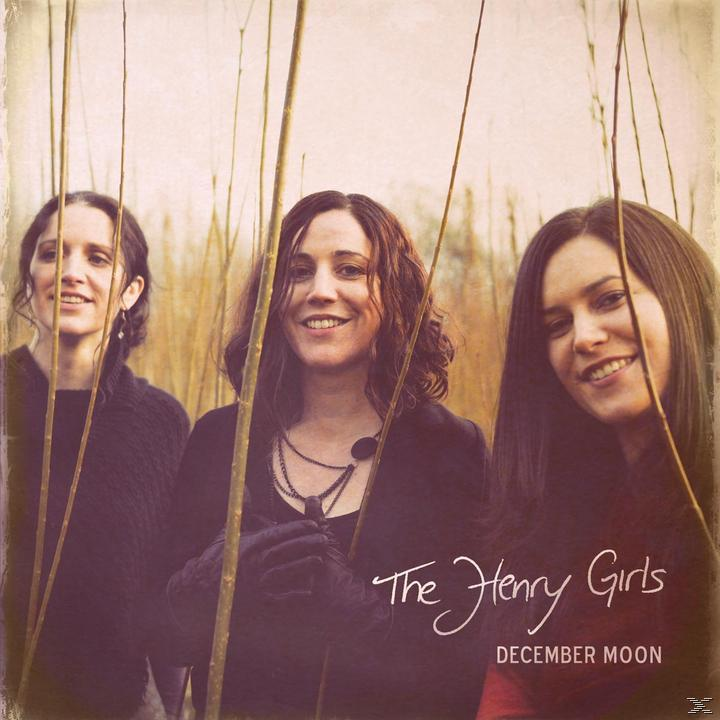 Albumcover: 3 Frauen vor hohem Gras. Titel: The Henry Girls December Moon.