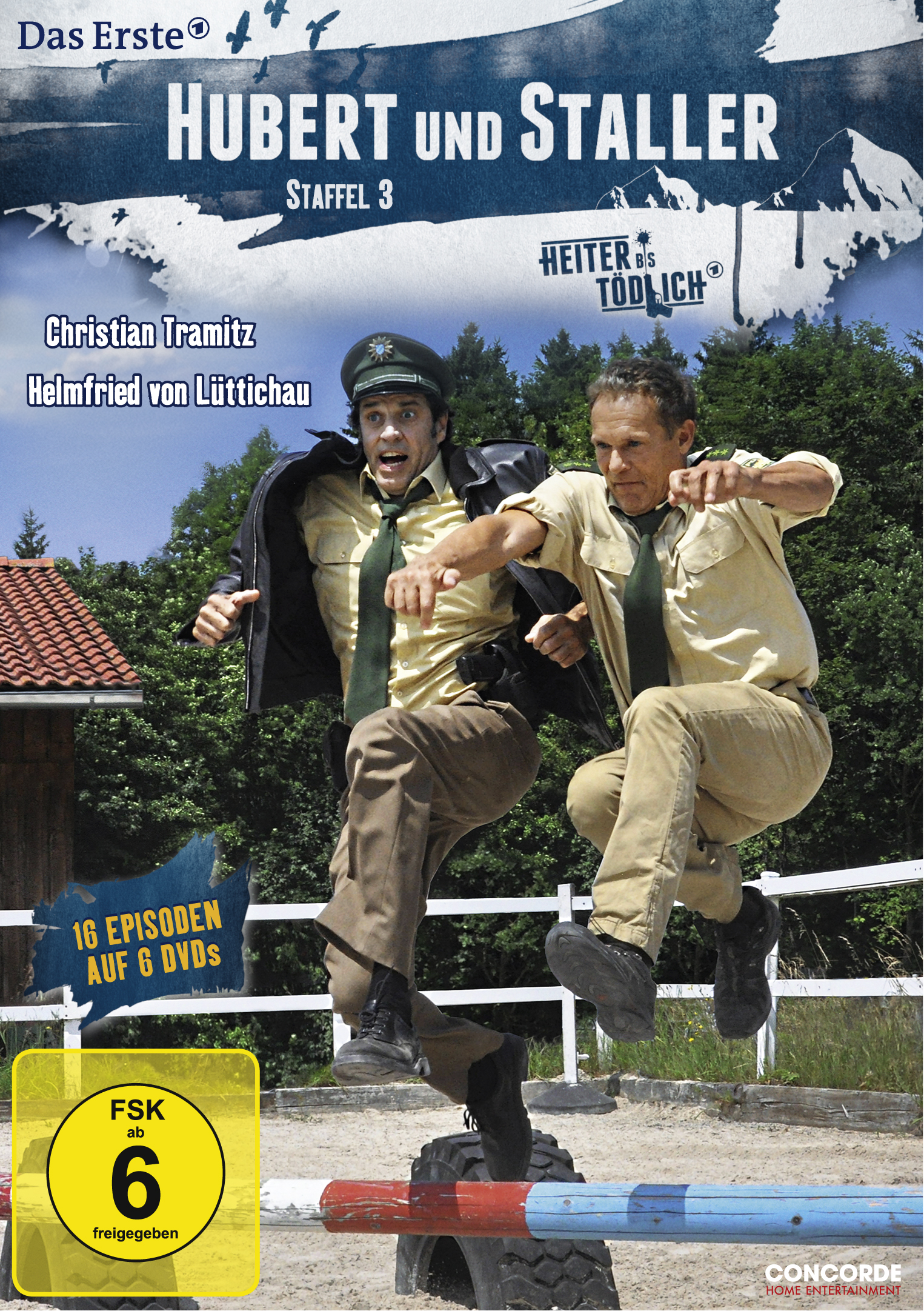 DVD-Cover. Zwei Männer in Polizeiuniformen springen. Titel: Hubert und Staller.