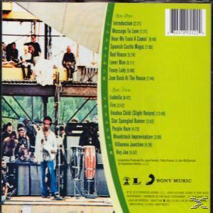 CD-Rückseite mit Bühnenfoto und Titelliste. Grüner Hintergrund, verschiedene Künstler und ein Sony Music-Logo.