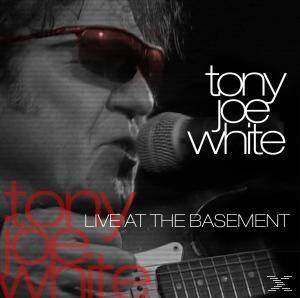 Albumcover: Tony Joe White, rote Sonnenbrille, Mikrofon. Text: Tony Joe White, Live at the Basement.