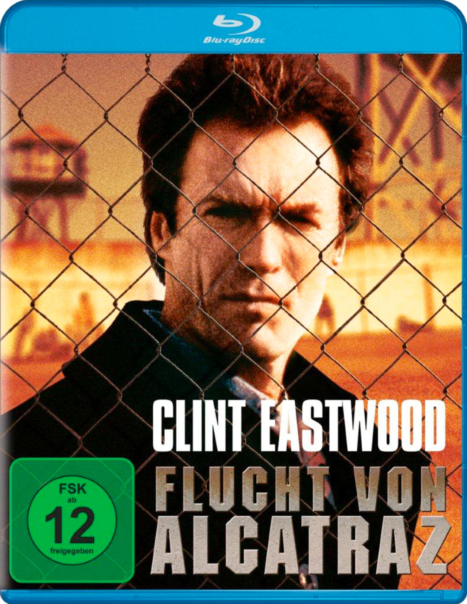 Blu-ray-Cover: Clint Eastwood hinter einem Maschendrahtzaun. Der Titel lautet 'Flucht von Alcatraz'.