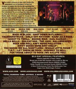 Rückseite einer DVD-Hülle. Text und ein Foto einer Band, die live auf der Bühne auftritt.