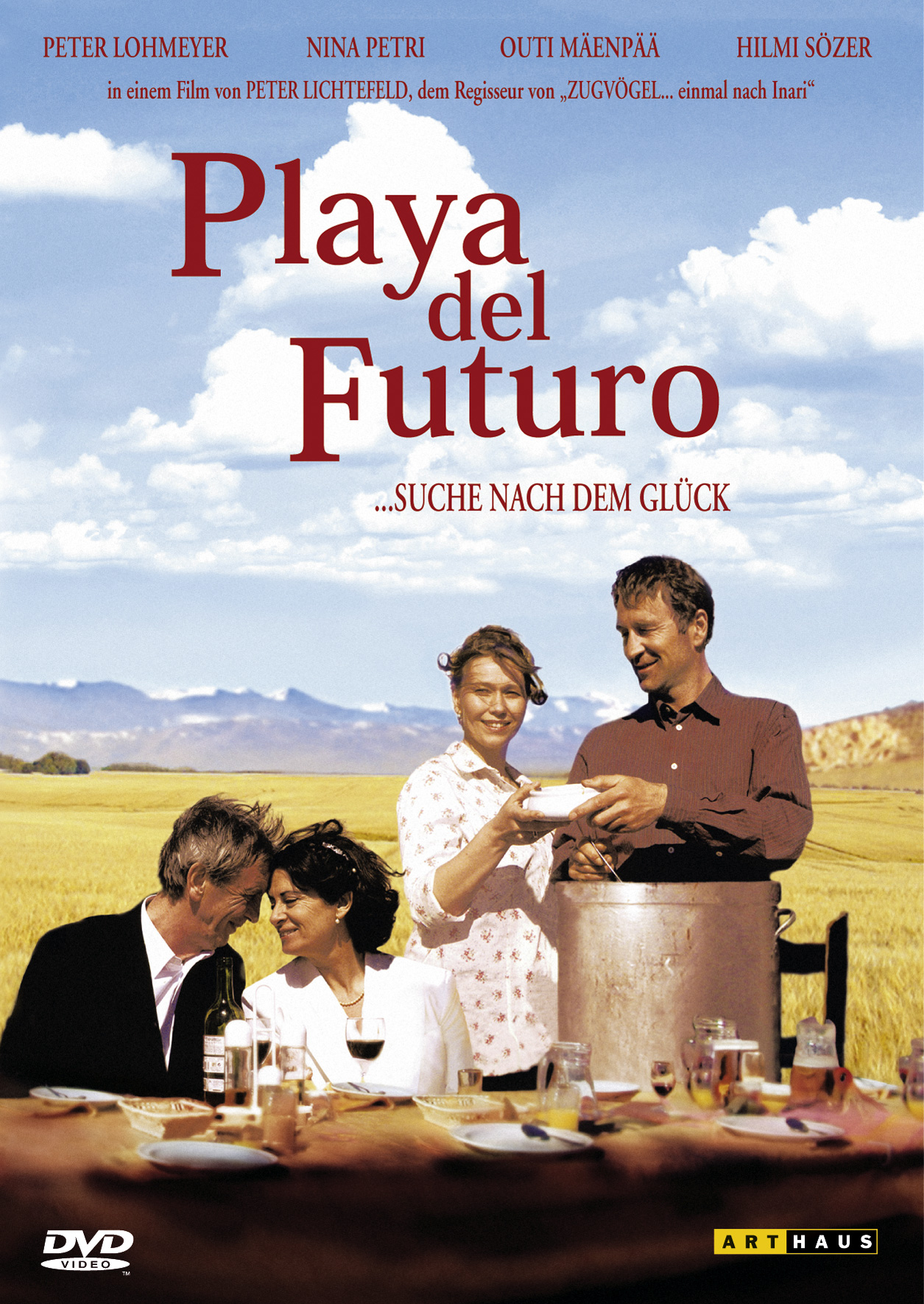 Filmplakat mit Personen an einem Tisch. Der Titel steht rot oben. Der Hintergrund ist ein Feld und Himmel.