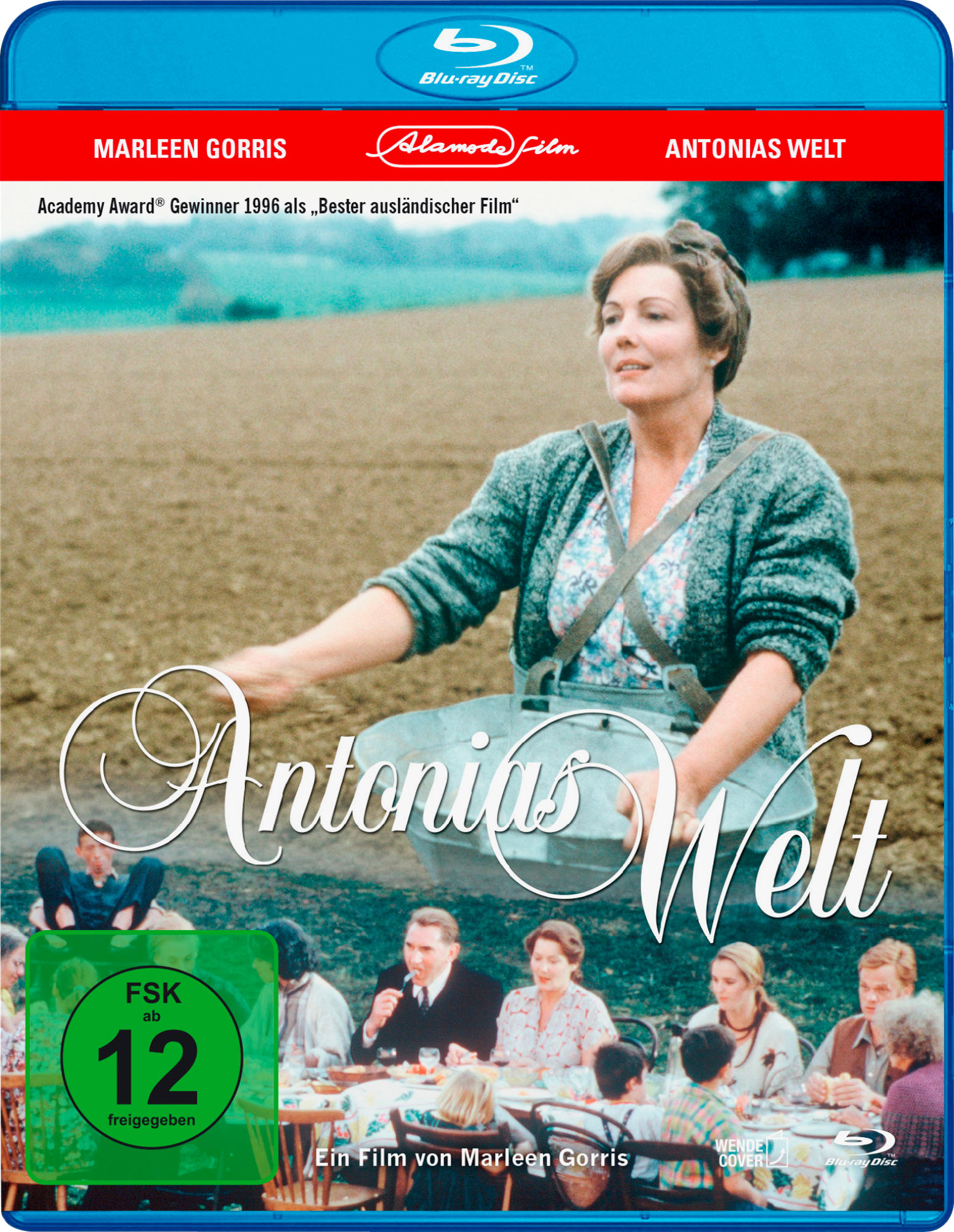 Blu-ray-Cover: Frau in einem Feld, Titel 'Antonias Welt'. Menschen sitzen im Hintergrund an einem Tisch.