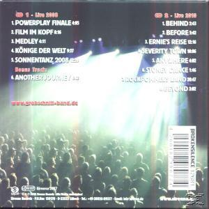 CD-Rückseite: Grobschnitt-Band, Live-Songs, Bühne mit Lichtern, Publikum.