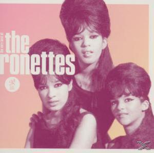Drei Frauen, The Ronettes, posieren auf dem Albumcover. Rosa Hintergrund, weißer Text.