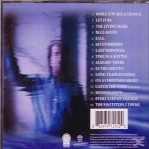 Albumcover mit verschwommenem blauem Bild einer Person, Titelliste mit Songnamen, Barcode und Copyright-Informationen.