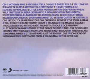 Albumcover mit lila und blauem Hintergrund, Songtiteln in Weiß. Sony Music Logo.