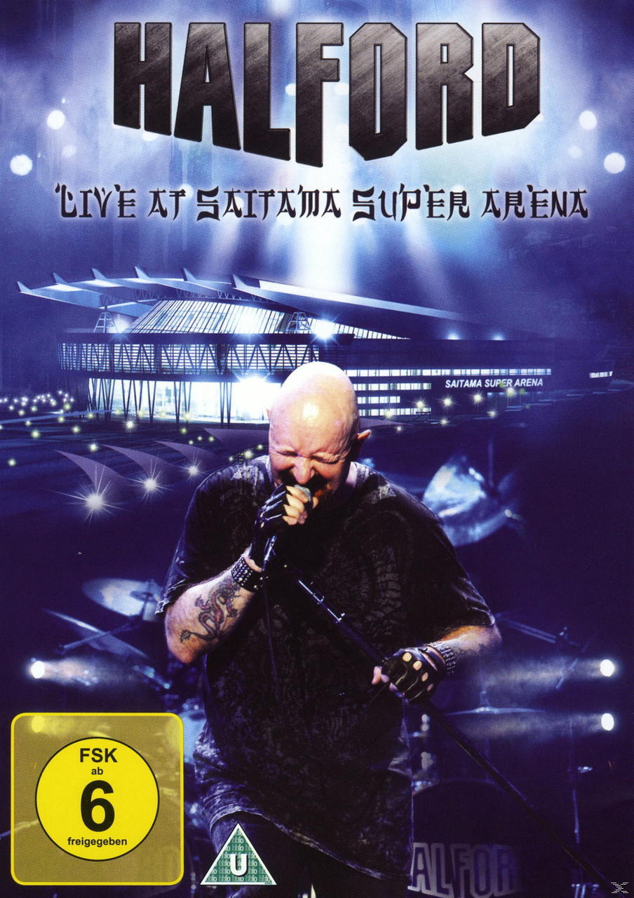 Live at Saitama Super Arena DVD-Cover. Ein kahler Mann singt in ein Mikrofon.
