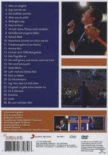 DVD-Rückseite mit einem singenden Mann und Titelliste, blauer Hintergrund.