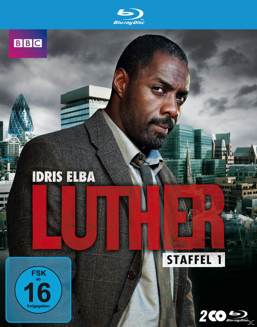 DVD-Cover von Luther, ein Mann im Anzug, mit Stadtkulisse und dem BBC-Logo.