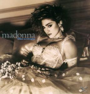 Madonna Albumcover, Madonna liegt auf Bett, Blumen, Sepia.