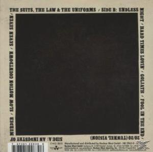 CD-Rückseite: Schwarzes Quadrat, Text, Details zu Seite A und B. Schwarz und Weiß.