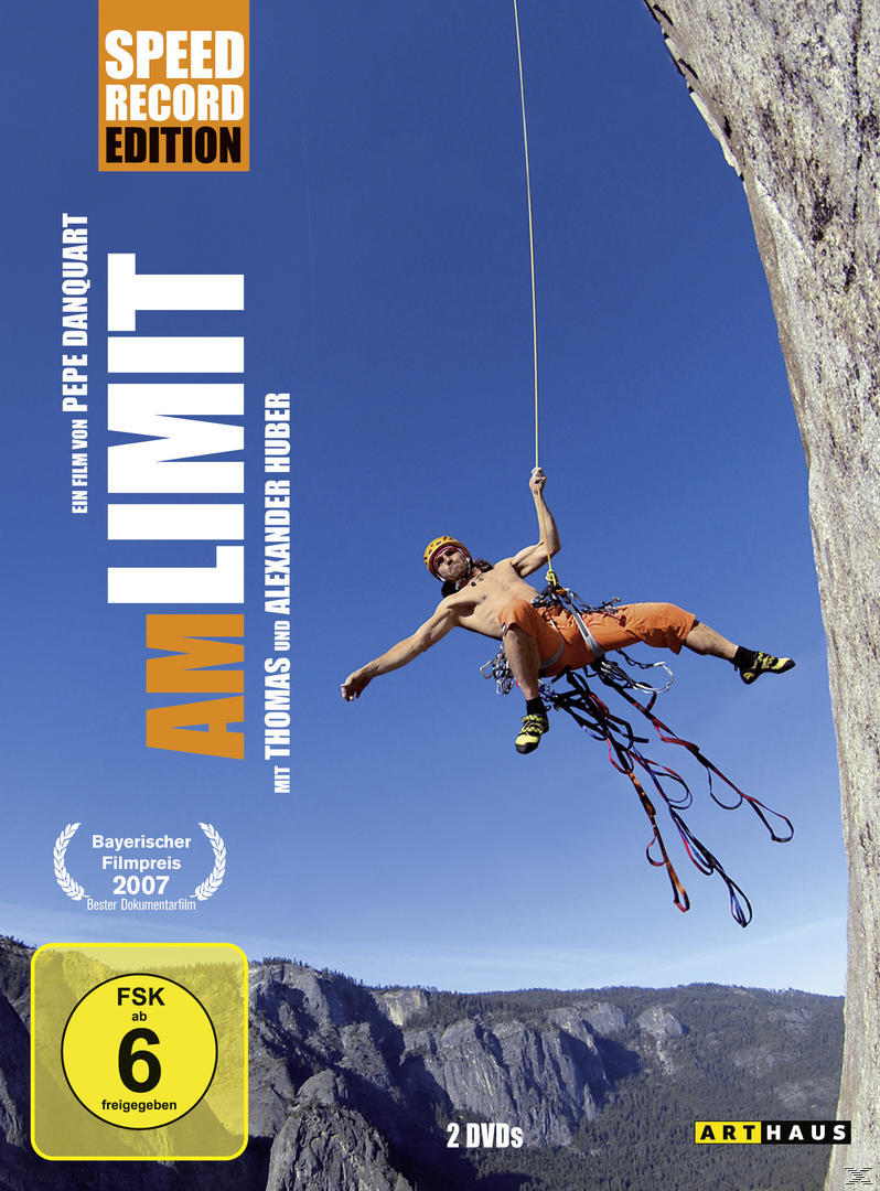 DVD-Cover mit einem Mann, der an einem Seil an einer Klippe hängt, mit Text auf Deutsch.