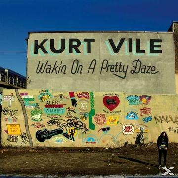 Albumcover mit einer Graffiti-Wand und einer Person davor.