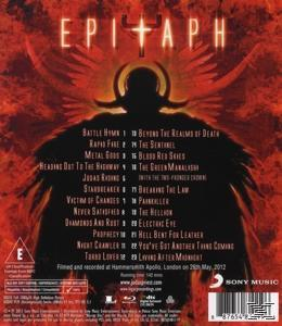 Rückseite eines Albums mit einer Silhouette einer Figur mit Flügeln und Text mit Titeln.