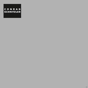 Albumcover mit grauem Hintergrund und Conrad Schnitzlers Namen in einem schwarzen Kasten.