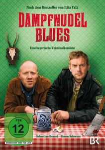 DVD-Cover mit zwei Männern am Tisch. Text auf Deutsch. Grüner Hintergrund.