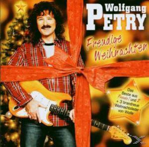 CD-Cover des Weihnachtsalbums von Wolfgang Petry. Wolfgang Petry hält eine Gitarre. Ein großes rotes Band ist sichtbar.