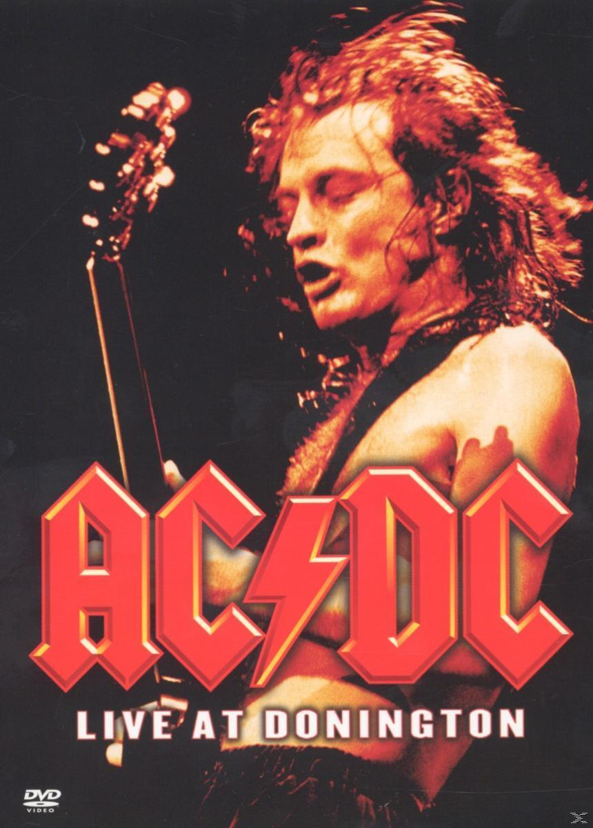 AC/DC Live at Donington DVD-Cover. Mann mit Gitarre, Bühnenbeleuchtung und das Logo der Band auf schwarzem Hintergrund.