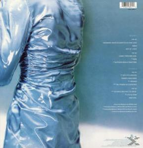 Albumcover: Eine Frau in einem glänzenden blauen Kleid, mit Text an der Seite.