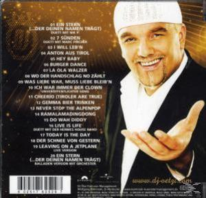 CD-Cover mit einem lächelnden Mann, Hand ausgestreckt, und einer Titelliste. Weißer Hintergrund.