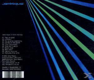 Albumcover mit blauen und grünen Linien, Text 'Jamiroquai' und Trackliste auf schwarzem Hintergrund.