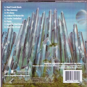 CD-Hülle hinten mit einer Liste von Songs und einem Bild einer futuristischen Stadt mit Kristallen.