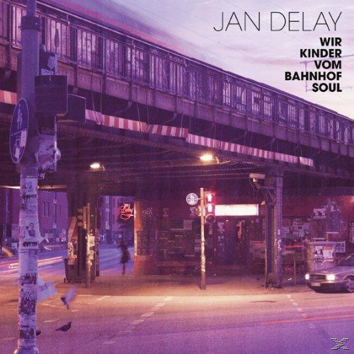 Albumcover von Jan Delay. Nachtszene, Straße mit Eisenbahnbrücke, Auto und Menschen.