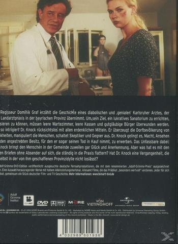 DVD-Cover. Ein Mann im weißen Kittel und eine Frau stehen in der Nähe eines Büros, Text unten.