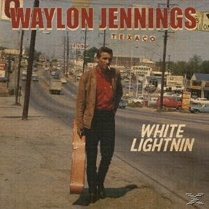 Albumcover. Mann mit Gitarre, Texaco-Schild und Straße.