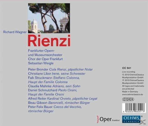 Albumcover mit Text auf Deutsch. Hintergrund zeigt ein Gebäude mit Bäumen.
