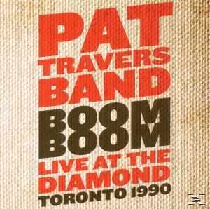 Pat Travers Band Albumcover. Roter und brauner Text auf tanfarbenem Hintergrund. Das Wort 'Boom'.