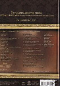 DVD-Cover mit Text. Text auf Deutsch mit einer Liste von Songs. Brauner Hintergrund.