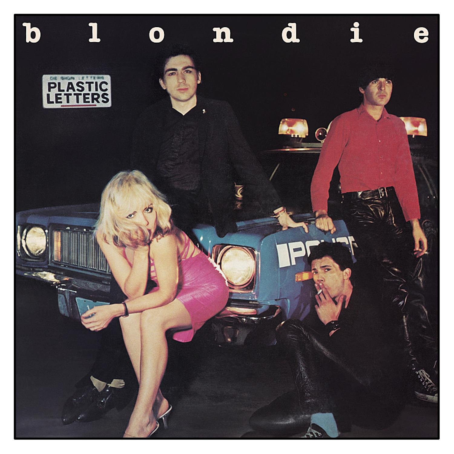 Blondie-Albumcover mit Bandmitgliedern und einem Polizeiauto.