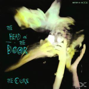 Albumcover für The Cure, mit abstrakter Kunst mit nach oben greifenden Händen und Text.