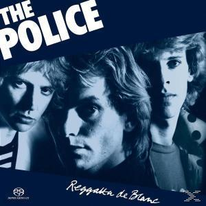 Album borító, The Police. Három zenekari tag. Kék háttér, fehér szöveg: Reggatta de Blanc.