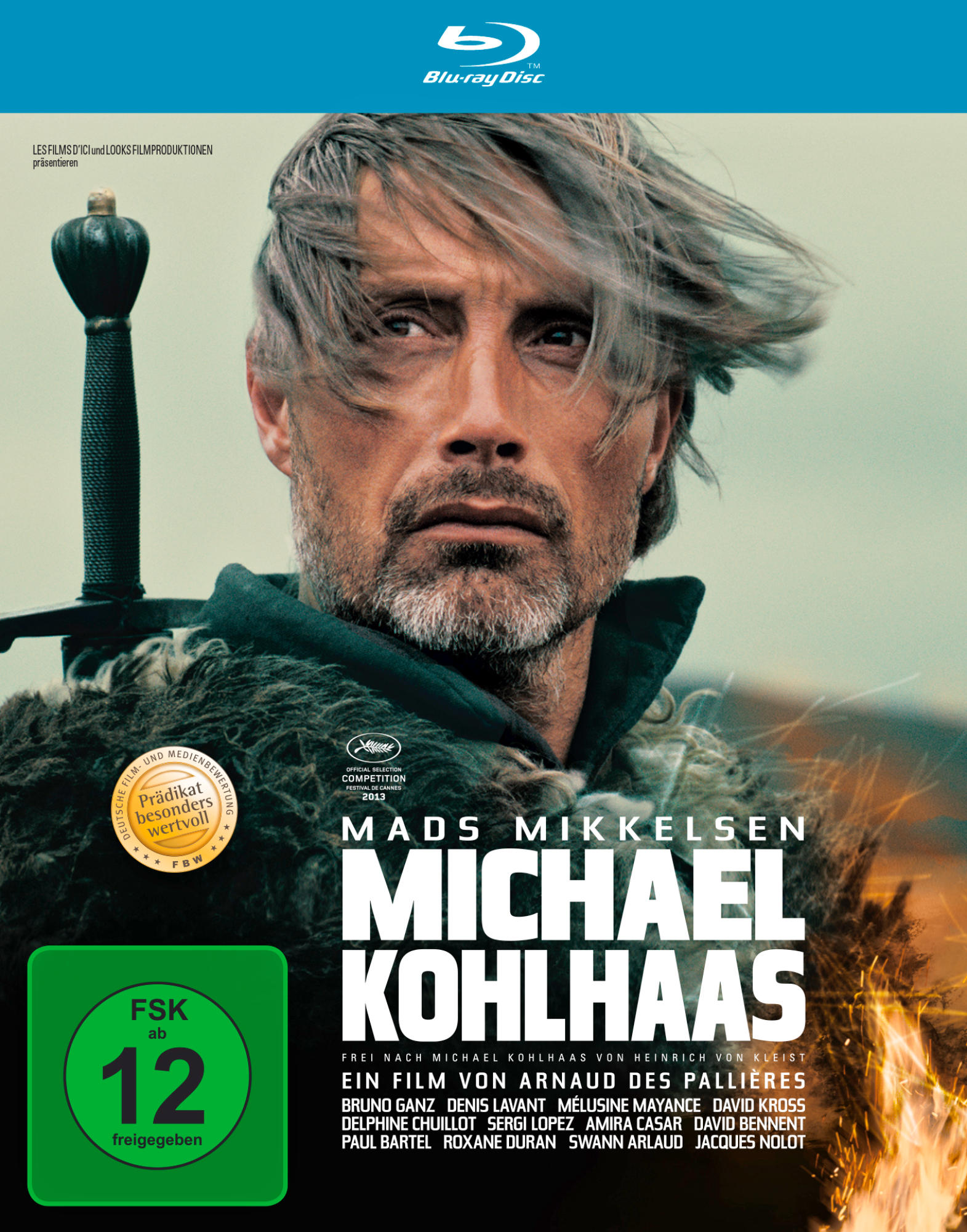 Filmposter. Mads Mikkelsens Gesicht mit Bart, Titel Michael Kohlhaas. Grünes Rating-Label.