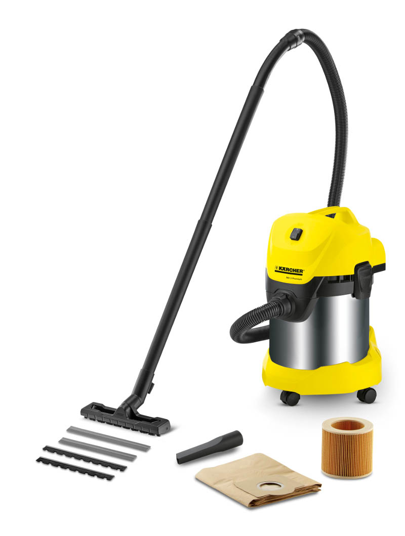 Gelber Kärcher Staubsauger. Zubehör: Düse, Filter, Schlauch, Papiertüte und Bürstenköpfe.