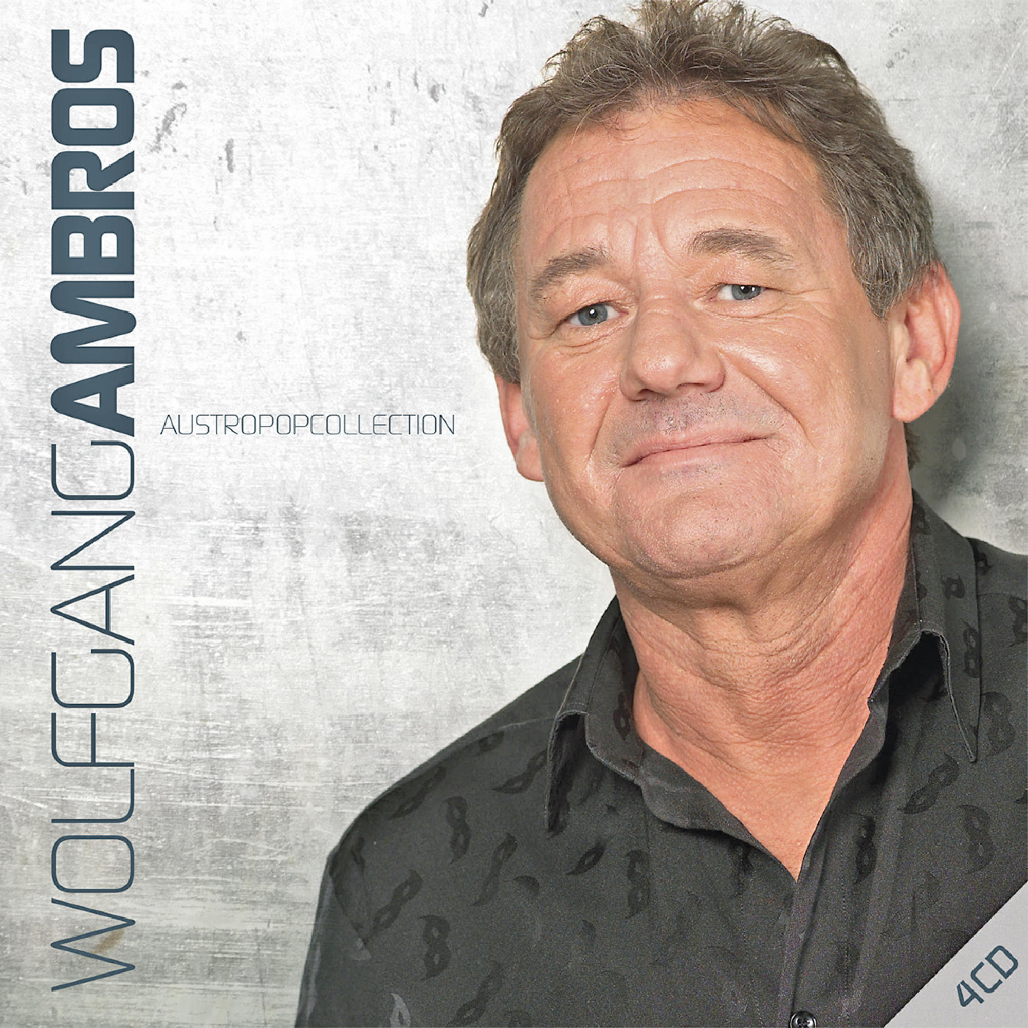 Albumcover. Wolfgang Ambros. Austropopcollection. Porträt eines Mannes auf grauem Hintergrund.