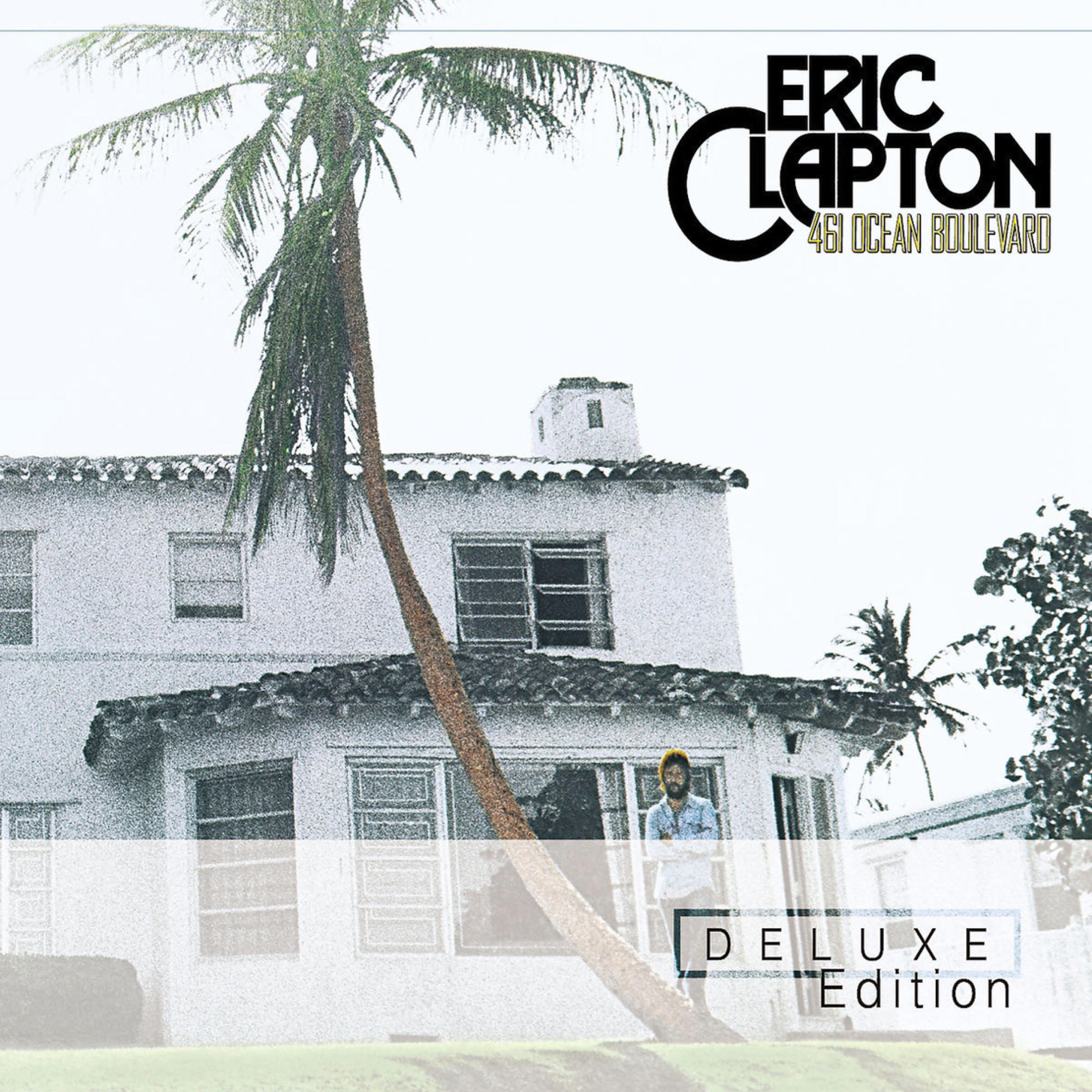 Albumcover: Eric Clapton, 461 Ocean Boulevard, ein weißes Haus und eine Palme.