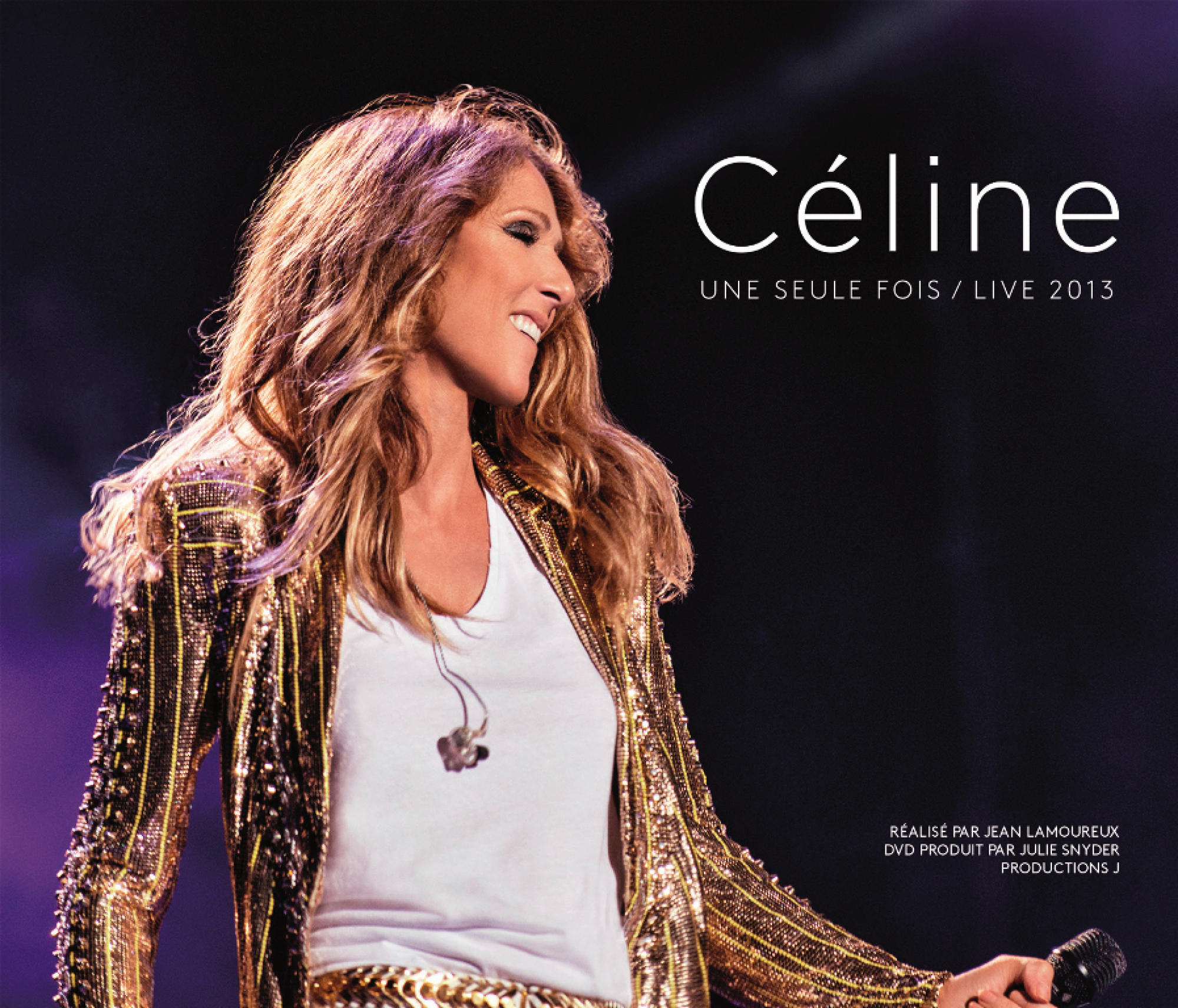 Celine Dion op het podium, lachend, in een gouden jas. Titel: Celine, Une Seule Fois/Live 2013.